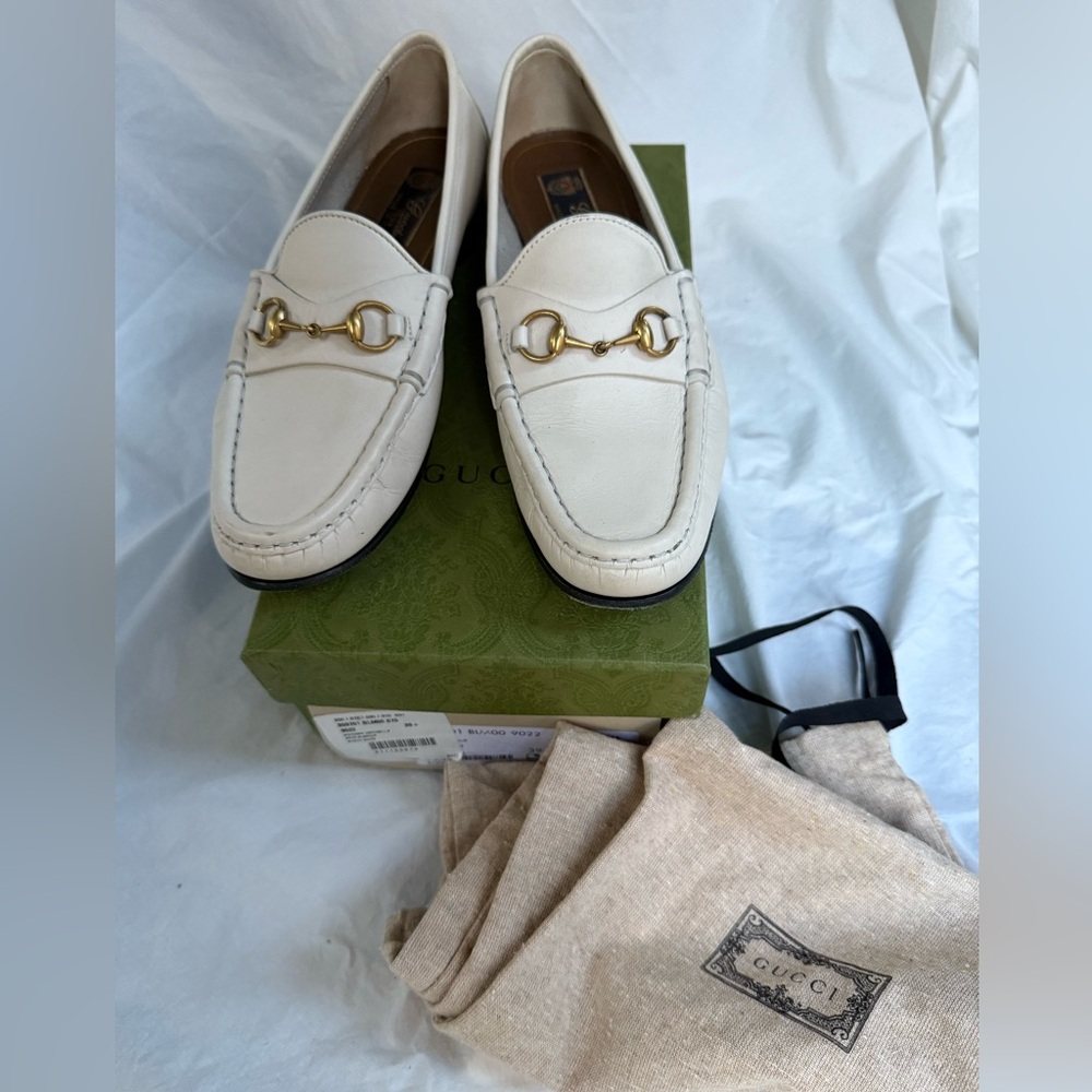 Gucci Ivory Loafers with Gold Accents